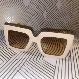 Tan with gold details